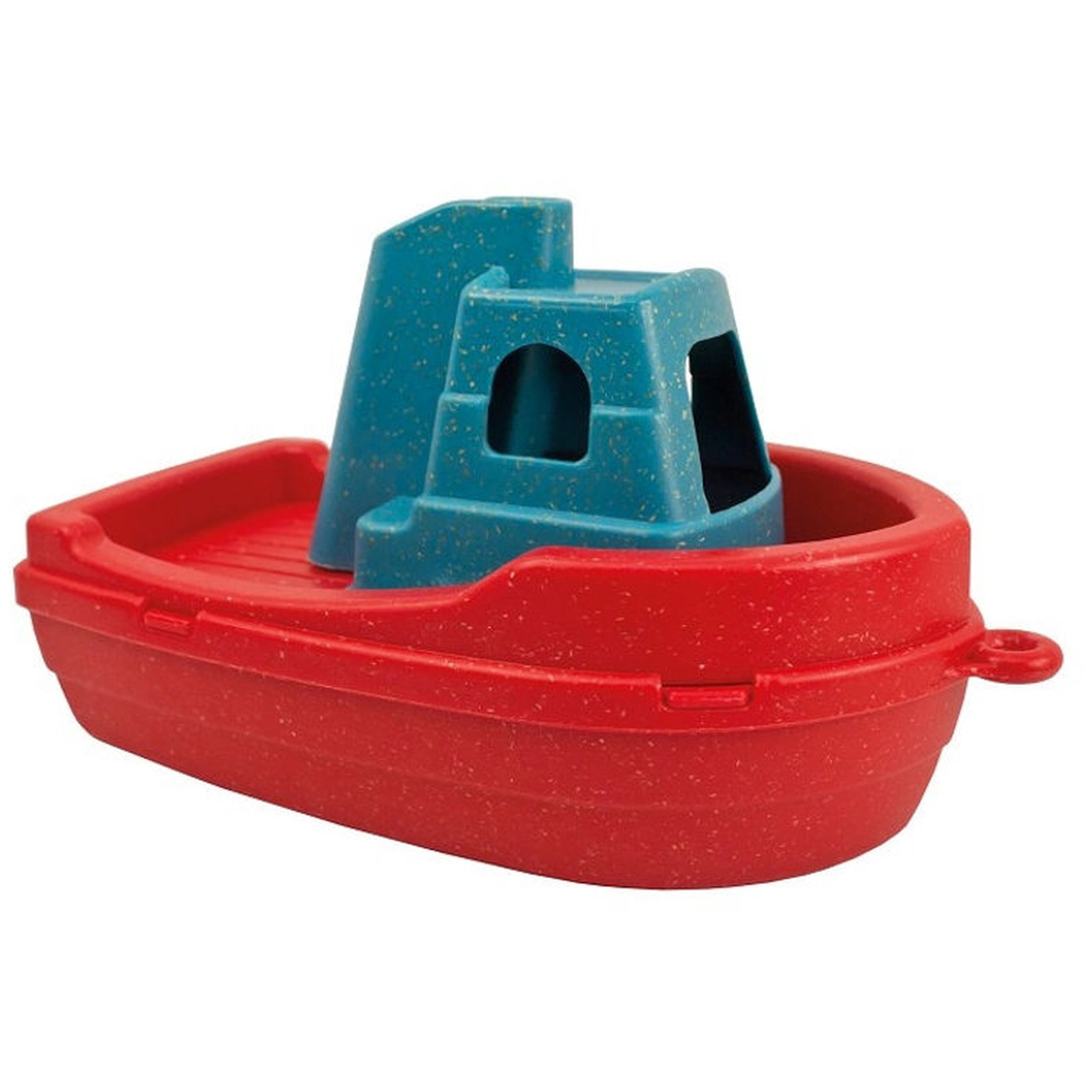 Red and blue tugboat toy with a speckled texture, featuring a central cabin and rounded edges.