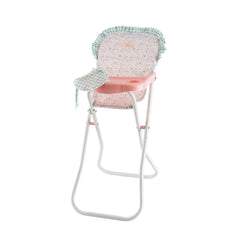 High chair for dolls with pink tray, floral cushion, and gingham bib, featuring white metal legs and ruffled edges.