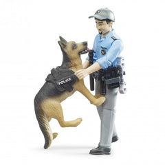 Police officer toy figure with blue uniform and cap, holding a baton, accompanied by a German shepherd in a police vest.