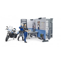 Police station playset with officer, detained figure, police motorcycle, and detailed office setup.