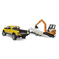 Yellow toy truck and orange mini excavator on a white trailer, part of Bruder Construction playset.