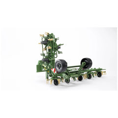 Green Bruder Krone Rotary Tedder model with foldable beams and detailed wheels, suited for play and learning.