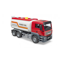Red and white Bruder MAN TGS tank truck toy with six wheels and "Power Fuel" label on side.