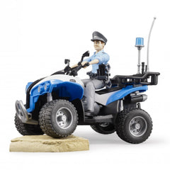 Police officer figurine on blue quad bike with accessories, featuring rugged tires and realistic details on sandy terrain.