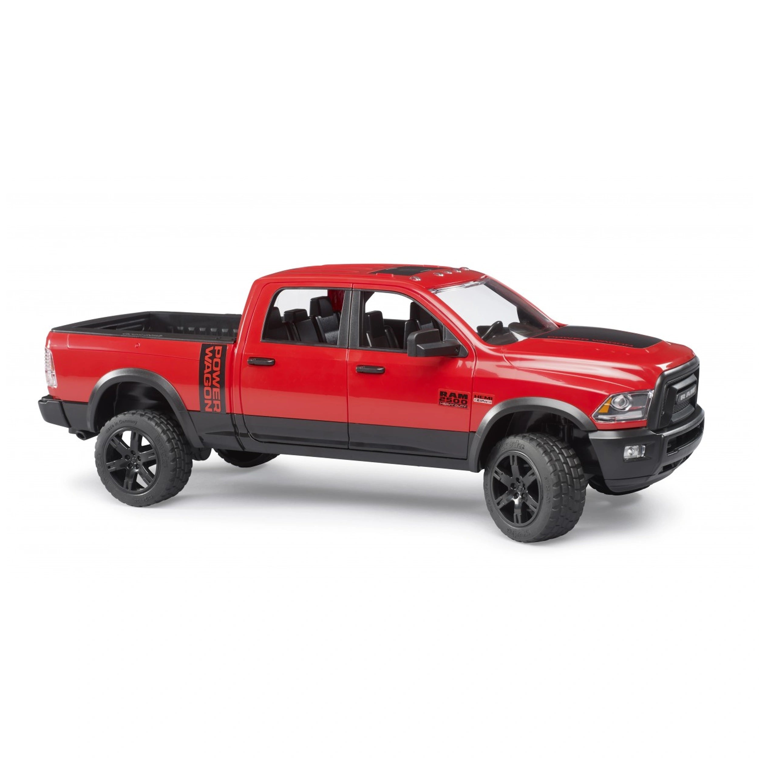 Red Bruder RAM 2500 Power Wagon toy truck with black trim and realistic details, showcasing a sturdy design.