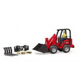Red Bruder Schäffer Compact Loader 2630 toy with figure, black attachments, and pallet for imaginative play.