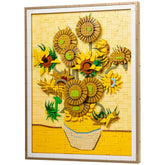 LEGO Art set featuring vibrant yellow sunflowers in a decorative frame, showcasing intricate petal details and a blue signature.