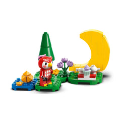 LEGO Animal Crossing construction set featuring Celeste the owl in a starry night scene, surrounded by flowers, a green tree, a yellow crescent moon, and playful accessories.