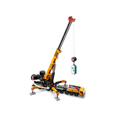 LEGO® City Mobile Construction Crane set featuring a vibrant yellow and black crane mounted on a detailed 16-wheel truck, lifting a load with a hook.