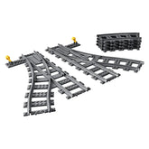 LEGO® City Switch Tracks set featuring four curved tracks and one left and right switch track in gray, designed for expanding train layouts.