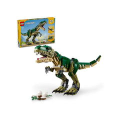 Lego Creator T. rex construction set featuring a green and beige articulated dinosaur with a detailed head and claws, alongside a nest with two white eggs.