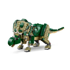 Highly posable LEGO Creator T. rex in green and tan colors, showcasing intricate detailing and dynamic posture, with a fierce expression and articulated limbs.