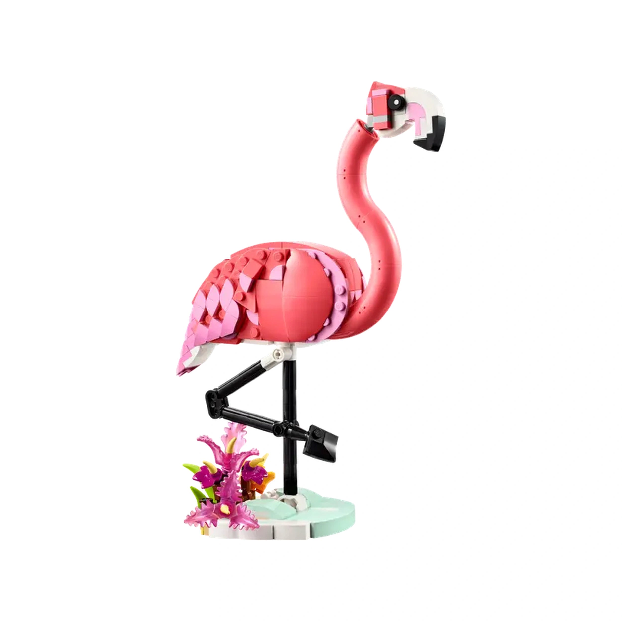 Colorful LEGO Creator 3in1 pink flamingo construction set, posed on one leg, surrounded by vibrant plant elements on a white background.