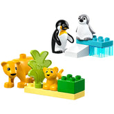 Colorful LEGO® DUPLO® construction set featuring two penguins on an icy platform and a lion with its cub near a green tree.