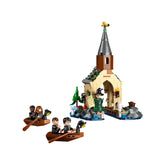 LEGO Harry Potter Hogwarts Castle Boathouse set featuring two boats with mini-figures, a charming boathouse, and trees.