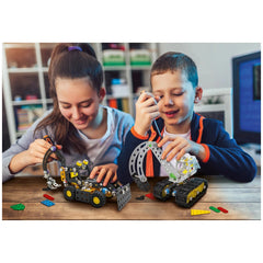 Children assembling the Alexander Constructor Diggy Ruspa toy set, focusing on building with metal and plastic parts.