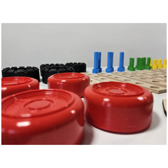 Red and black wheels, blue, green, yellow screws, and wooden boards from the Maly Constructor Junior Race Car set.