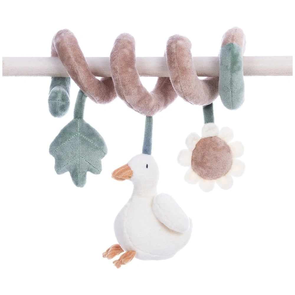 Plush spiral toy with duck, leaf, and flower attachments in soft pastel colors hanging on a rod.