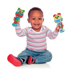 Baby Clementoni maracas in a child's hands, featuring vibrant colors and playful animal designs, as the child smiles on the f