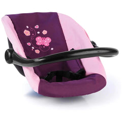 BAYER DESIGN doll car seat in pink and purple fabric with black handle and frame, featuring a harness and footrest.
