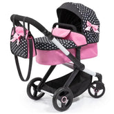 BAYER DESIGN Xeo-Doll's-Stroller features a black polka dot fabric, pink seat, and black handle with a pink bow.