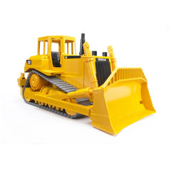Yellow Bruder CAT bulldozer toy with adjustable blade and rubber tracks on a white background.