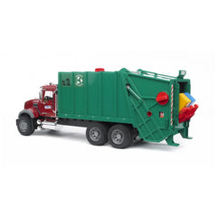 Red and green Bruder Mack Granite garbage truck with realistic features and tilting trash container.