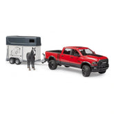 Red Bruder RAM 2500 Power Wagon toy with horse trailer and black horse.