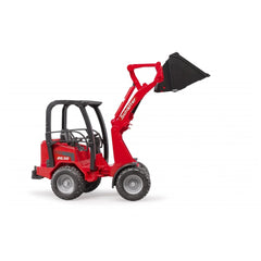 Red Bruder Schaffer Compact Loader 2630 with raised bucket, featuring realistic details and four large wheels.