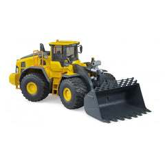 A Bruder - Volvo Wheel Loader L260H toy vehicle with a yellow cabin and black detailing, featuring a working bucket and steering wheel, displayed against a white background with a 'TOP 10 HITS 2022' award seal.