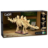 Dinosaur Fossil Stegosaurus construction set in beige, displayed in black packaging with white text and clear window.