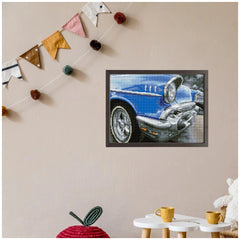 Diamond Dotz 50s Classic displayed on a white table with yellow cups, light beige wall, and a black television in background.