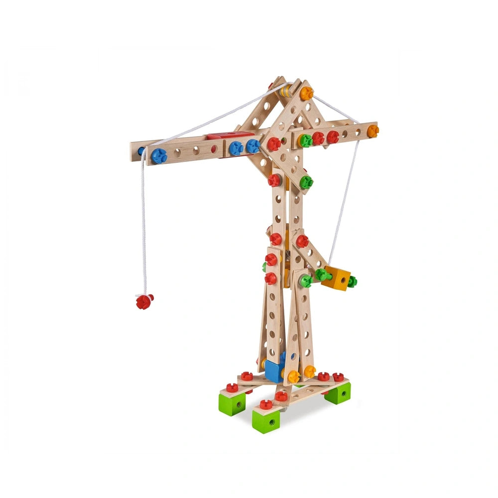 Wooden crane construction toy with a movable arm, colorful magnetic elements, and a base featuring four green blocks.