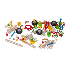 Eichhorn construction set features 111 colorful plastic parts including wheels, axles, and connectors scattered on a white ba