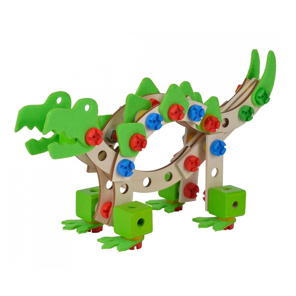 Eichhorn Constructor Dinosaur features a green alligator toy with segmented body, textured skin, and colorful decorative acce