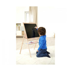 Eichhorn Standing Blackboard with a child drawing on it, in a cozy playroom setting with light-colored decor.
