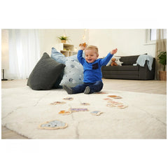 Eichhorn Wooden Animal Puzzle with 16 pieces, child joyfully playing indoors with educational toys on a colorful rug.