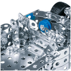 Eitech Speed Racer construction set features a shiny metal frame with a blue plastic wheel and metal axle in a close-up view.