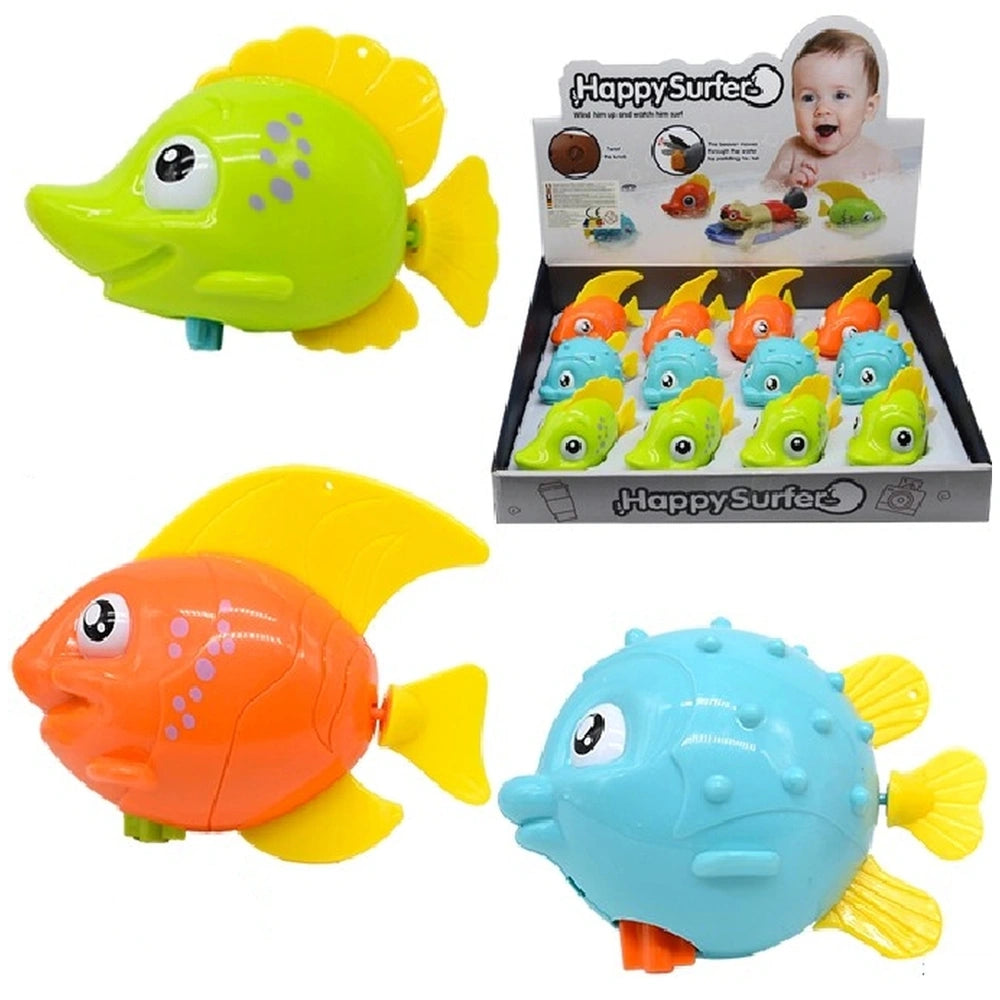 Happy Surfer Wind-Up Fish Toy in yellow, orange, and blue displayed in glossy white cardboard packaging with a transparent wi