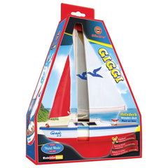 Gunther Flugspiele Captain Hook sailing boat packaging features a glossy red top, blue bottom, and white sail with yellow tex