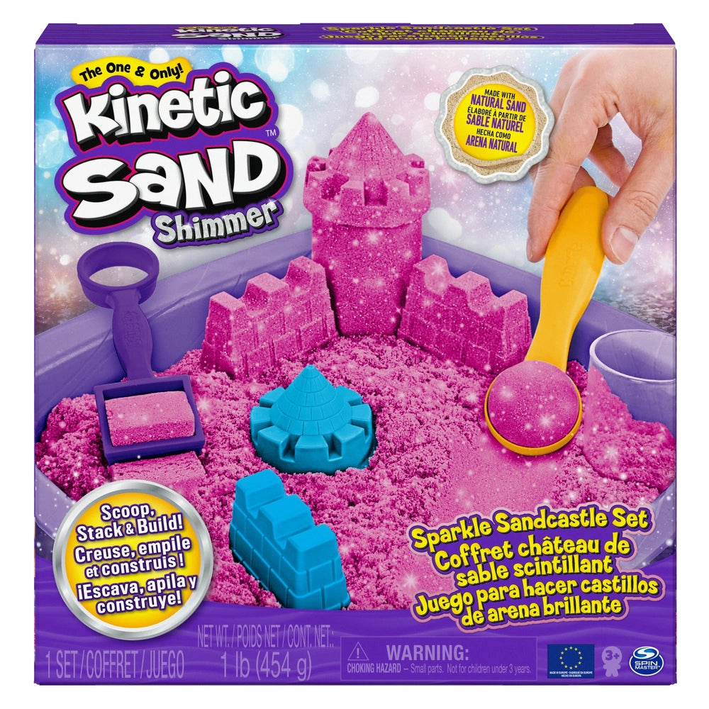 Kinetic Sand Shimmer Sparkle Sandcastle Set in a purple box with pink sand, plastic shovel, molds, rake, and sifter inside.