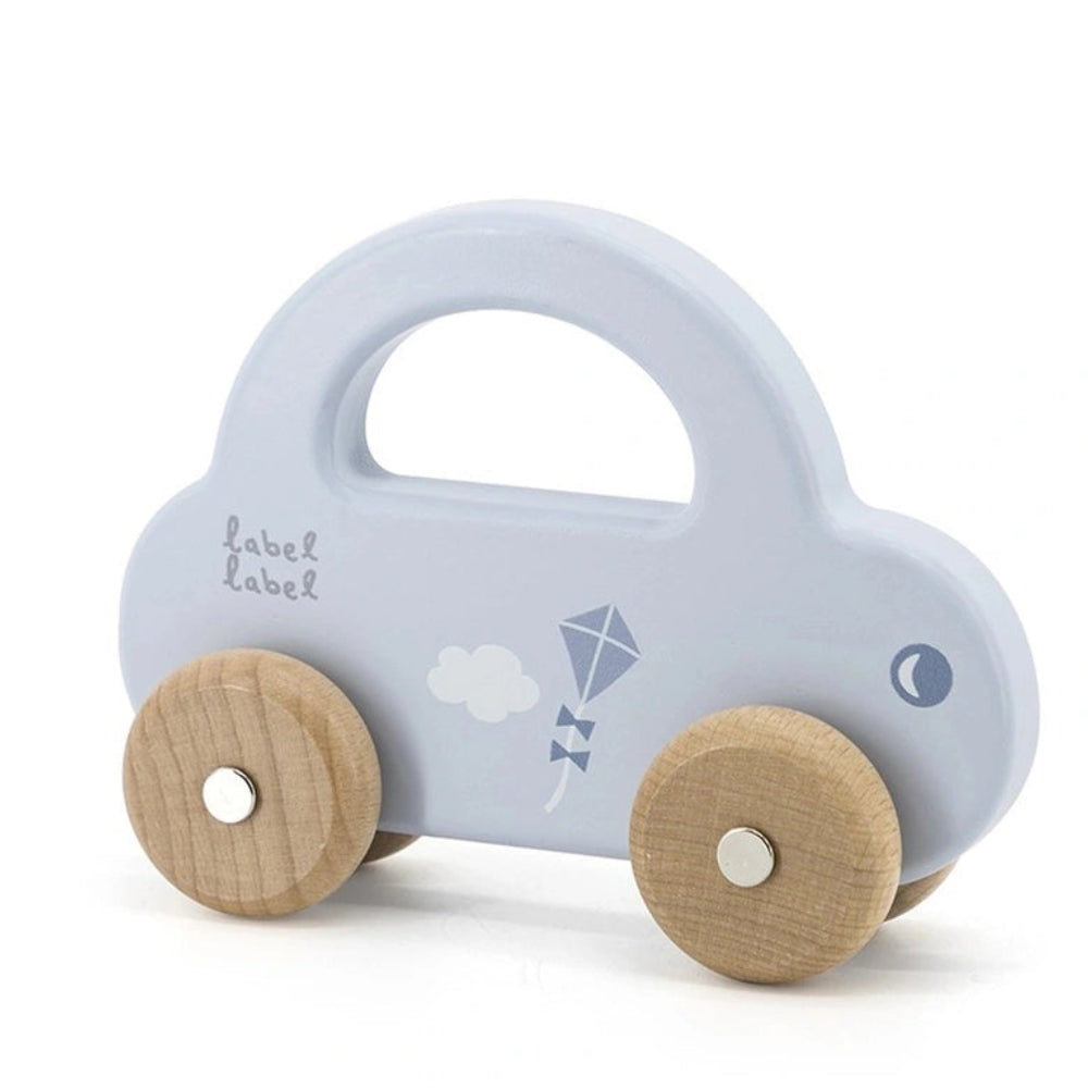 Little Car push and pull toy in white with blue roof, wooden wheels, kite design, and "label" text on the side.