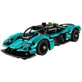 LEGO Aston Martin Valkyrie construction set features a glossy teal toy car with black wheels and yellow accents against a whi