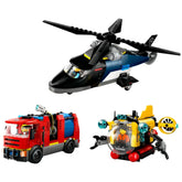 LEGO City construction set featuring a black helicopter with spinning rotors, a red fire truck, and a yellow submarine with claw arms.