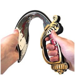 Pirate sabre toy with a black and white blade and a red and gold handle, held by hands against a plain background.