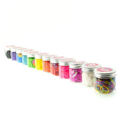 Elasticolor multicolor bands pack in twelve clear containers with metallic silver lids, displayed in retail packaging.