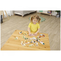 Noris 6 first Puzzles featuring farm animals, child engaged in assembling colorful puzzle pieces in cozy room.