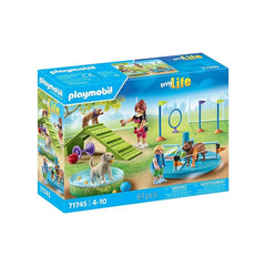 PLAYMOBIL Dog Park playset packaging features a glossy design with a clear window and includes toys like dogs, cats, and ramp