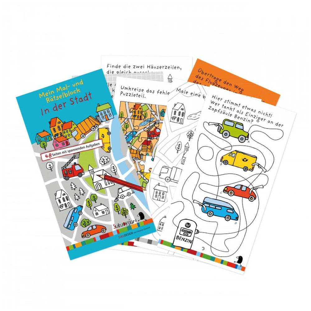 Puzzle block Suku - In the city features a glossy light blue packaging with a colorful city map illustration and black text.