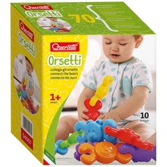 Quercetti Orsetti baby activity toys packaging features a colorful play mat design with a clear window and age 1+ marking.
